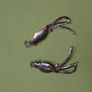 Silver, copper, and bronze bird earrings for pierced ears.
